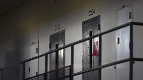 A red tag hangs on a cell door, indicating an active COVID-19 case for the occupant at Faribault Prison, in Faribault, Minnesota, USA on October 28, 2021. States have been rolling back the amount of information they publicly report about the status of the pandemic in correctional facilities. Photo by Aaron Lavinsky/Minneapolis Star Tribune/TNS/ABACAPRESS.COM