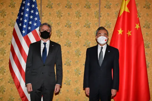 U.S. Secretary of State Antony Blinken and Chinese Foreign Minister Wang Yi pose for a picture before their meeting on the sidelines of the G20 summit in Rome, Italy October 31, 2021. Tiziana Fabi/Pool via REUTERS