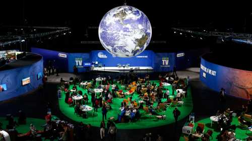 Participants rest in the Climate Action Hub during the sixth day of the COP26 UN Climate Change Conference, held by UNFCCC inside the COP26 venue - Scottish Event Campus in Glasgow, Scotland on November 5, 2021.  COP26, running from October 31 to November 12 in Glasgow, will be the most significant climate conference since the 2015 Paris summit as the nations are expected to set new greenhouse gas emission targets in order to slow the global warming, as well as firming up other key commitments. (Photo by Dominika Zarzycka/NurPhoto)NO USE FRANCE