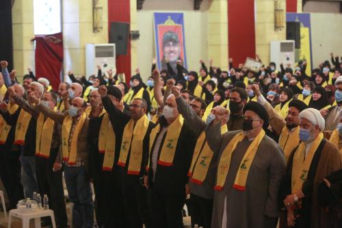 Supporters of Lebanon's Hezbollah leader Sayyed Hassan Nasrallah gesture during a rally commemorating the annual Hezbollah Martyrs' Day in Nabatieh, Lebanon, November 11, 2021. REUTERS/Aziz Taher