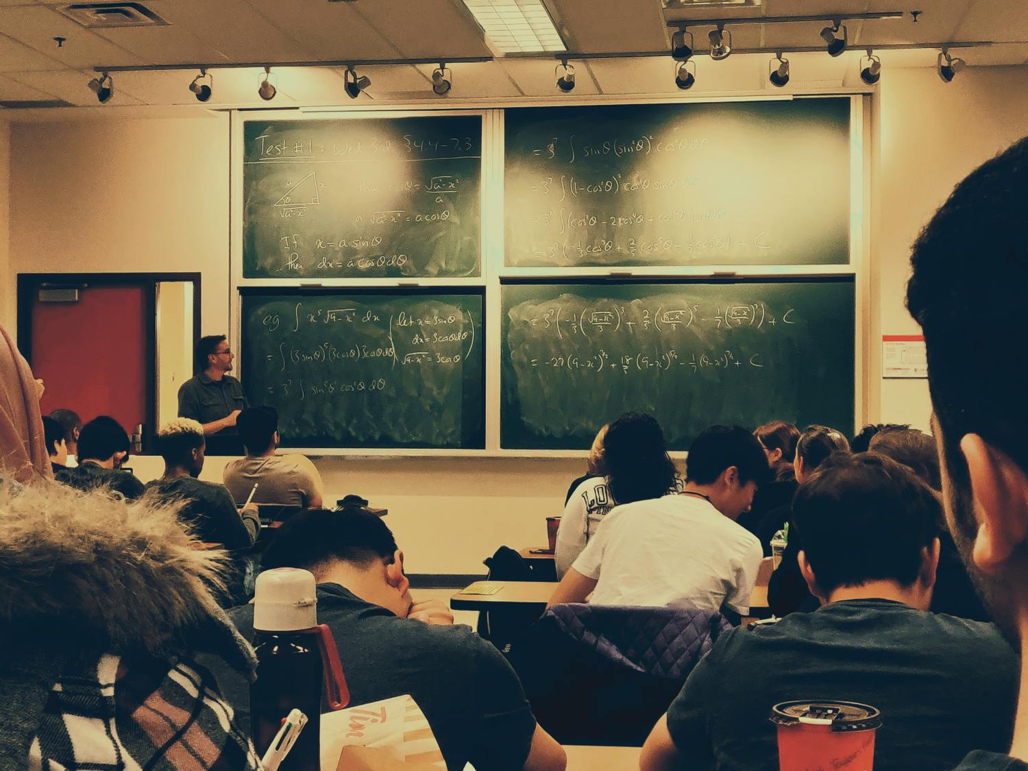 College classroom with math on chalkboard