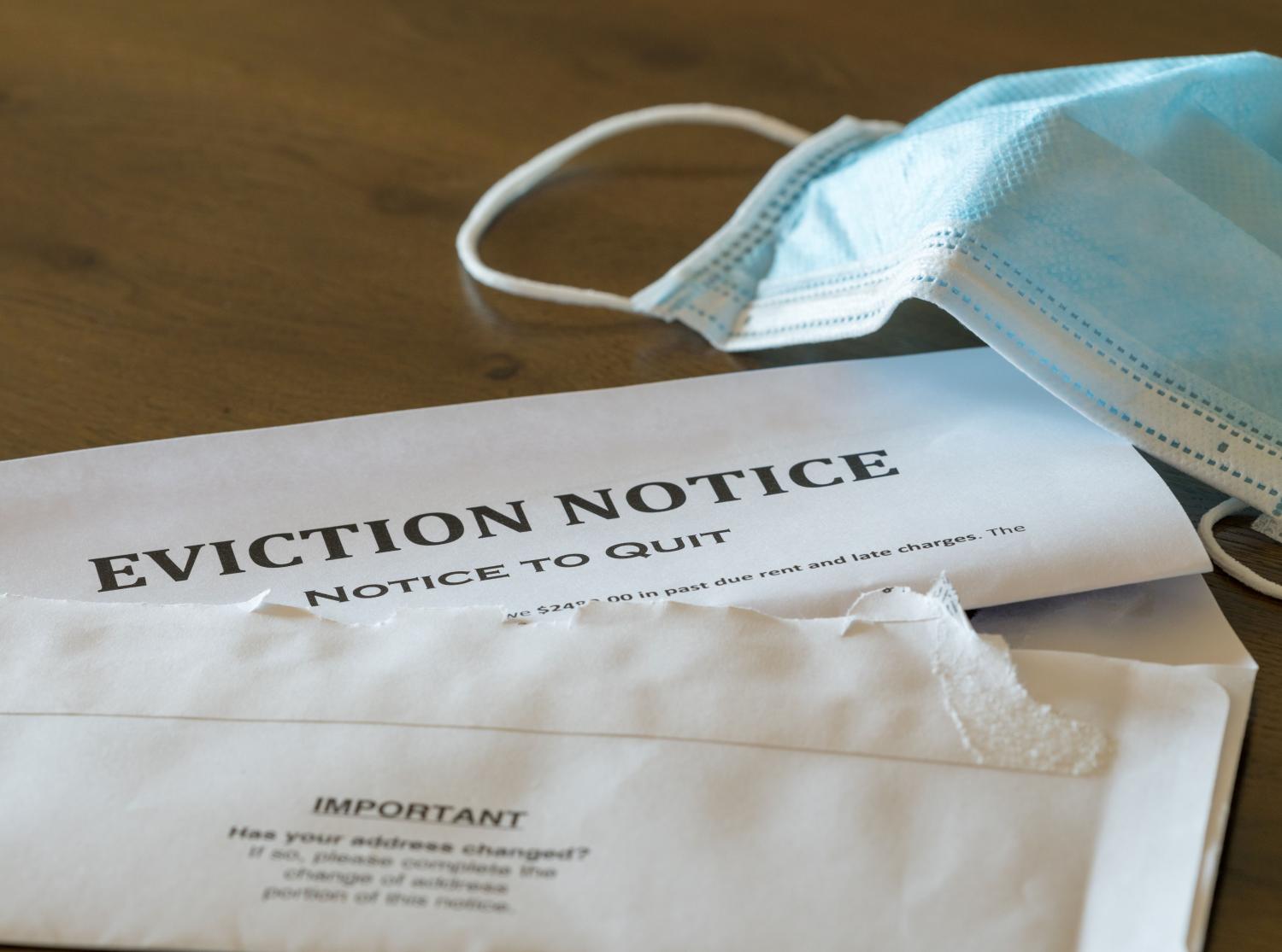 Eviction notice and surgical mask