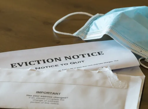Eviction notice and surgical mask