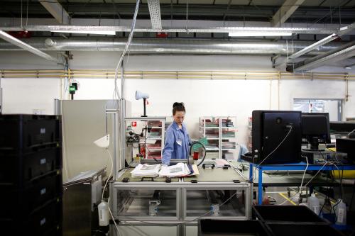 An employee works at the IMI plant in Botevgrad, western Bulgaria, April 4, 2014. Dozens of foreign companies from Japan to South Africa are driving an auto component manufacturing boom that could lift the fortunes of Bulgaria, the European Union's poorest member. Picture taken April 4, 2014.       To match BULGARIA-AUTOS/      REUTERS/Stoyan Nenov (BULGARIA - Tags: TRANSPORT BUSINESS EMPLOYMENT POLITICS)