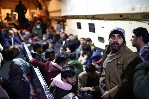 KABUL, AFGHANISTAN  NOVEMBER 19, 2021: People are seen aboard an evacuation flight to Russia. Russia's President Vladimir Putin has ordered to organize evacuation of over 380 citizens of Russia, CSTO member states (Belarus, Kyrgyzstan, Armenia), Ukraine and Afghanistan by military transport aircraft. Three Ilyushin Il-76 airlifters of the Russian Aerospace Forces have delivered 36 tonnes of humanitarian aid to Afghanistan. Valery Sharifulin/TASS.No use Russia.