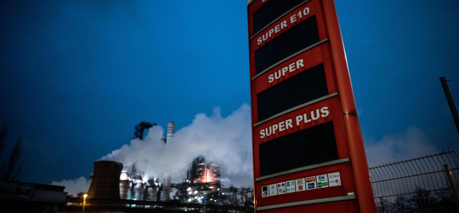 A display panel of a gas station is seen in front of the thyssenkrupp Steel plant in Duisburg Beeck.