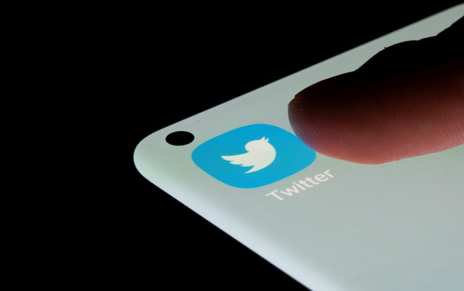 FILE PHOTO: Twitter app is seen on a smartphone in this illustration taken, July 13, 2021. REUTERS/Dado Ruvic/File Photo