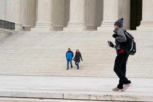 Supreme Court with man on phone