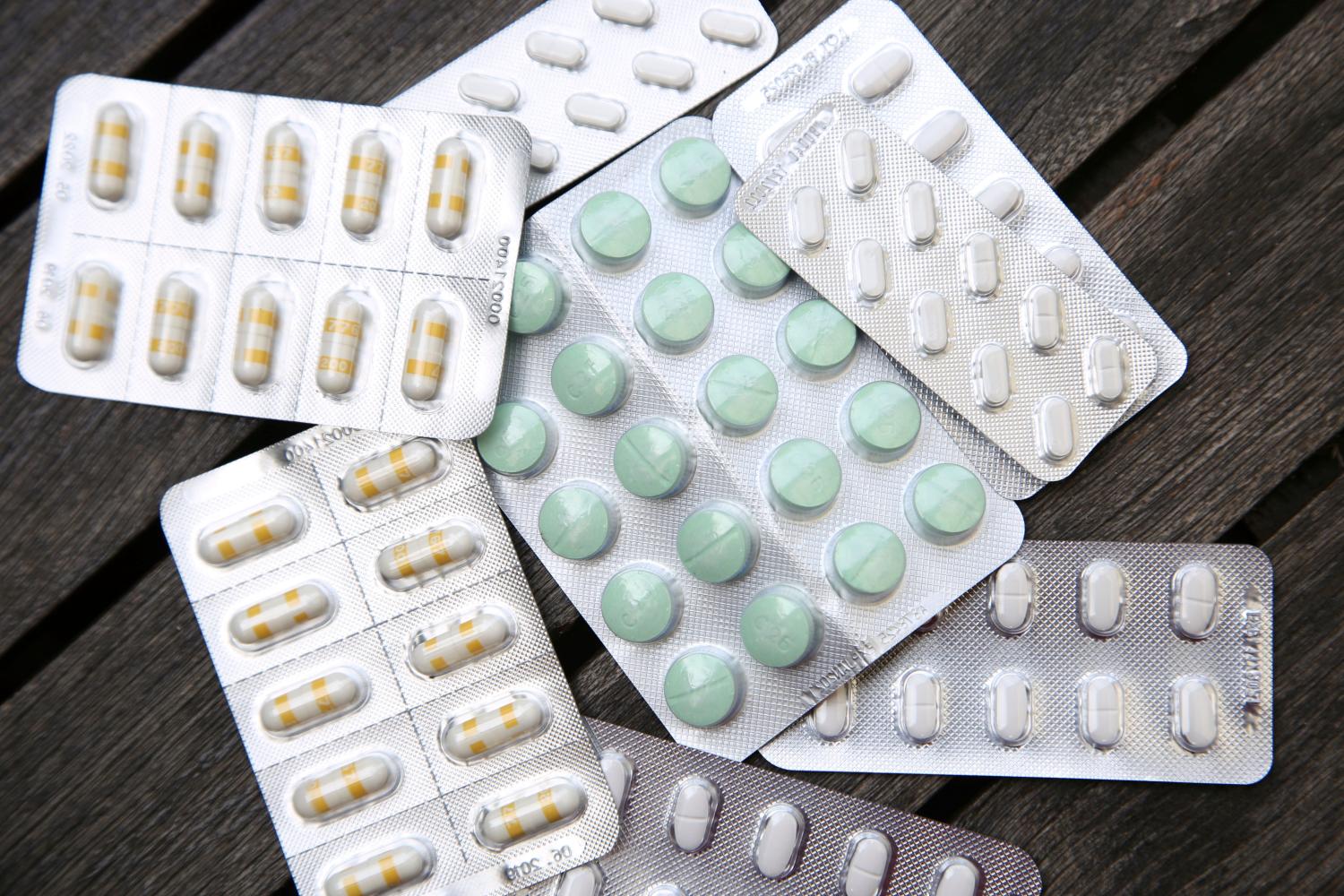 Cape Town, South Africa - April 28, 2020: Prescription medication on a wooden table.