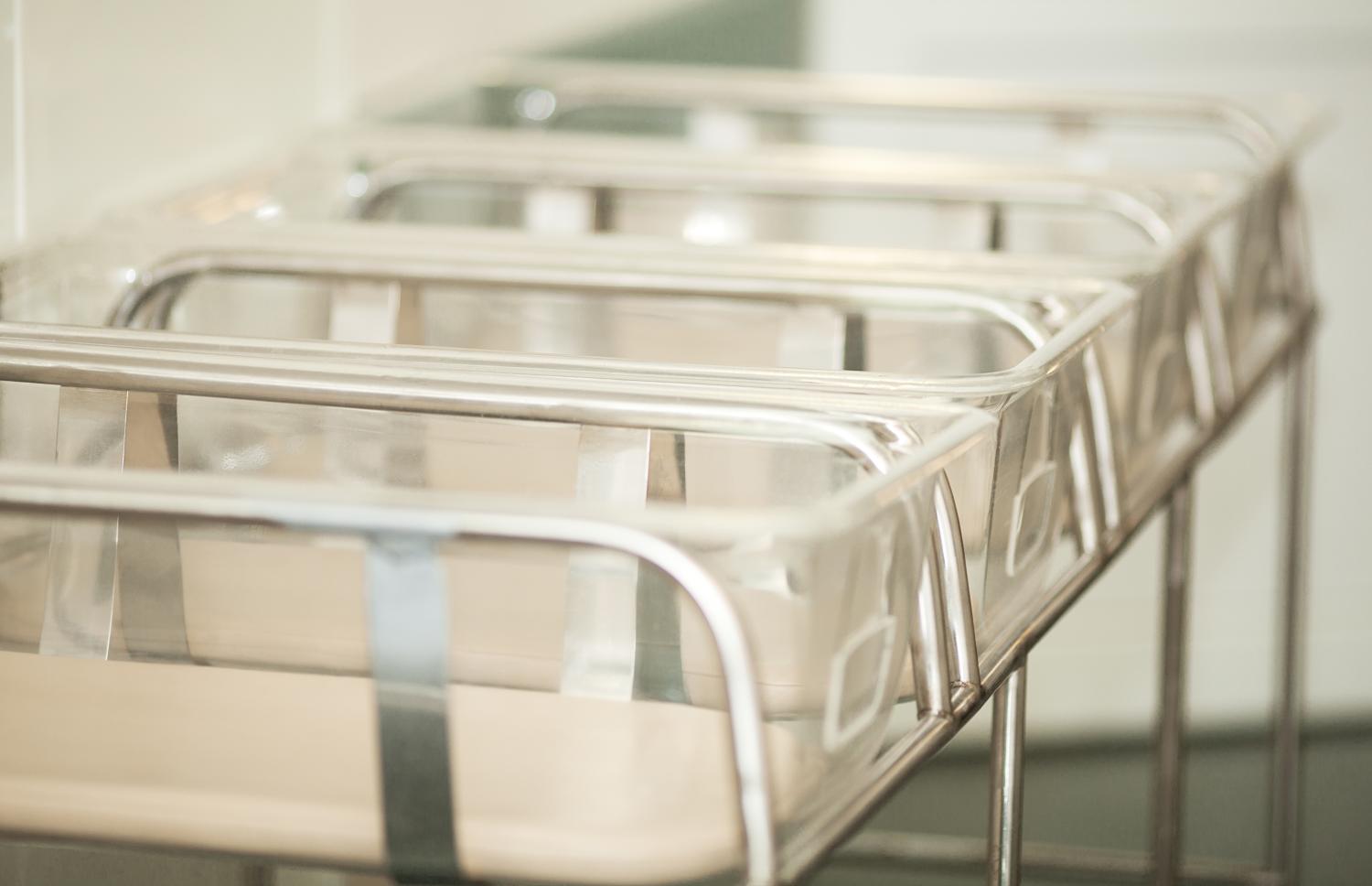 Empty newborn baby beds in hospital