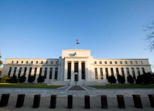 The Federal Reserve Building in Washington while the Fed is inside meeting, October 29, 2008. The Fed is expected to lower the prime rate today after two-days of meetings.    REUTERS/Larry Downing  (UNITED STATES)