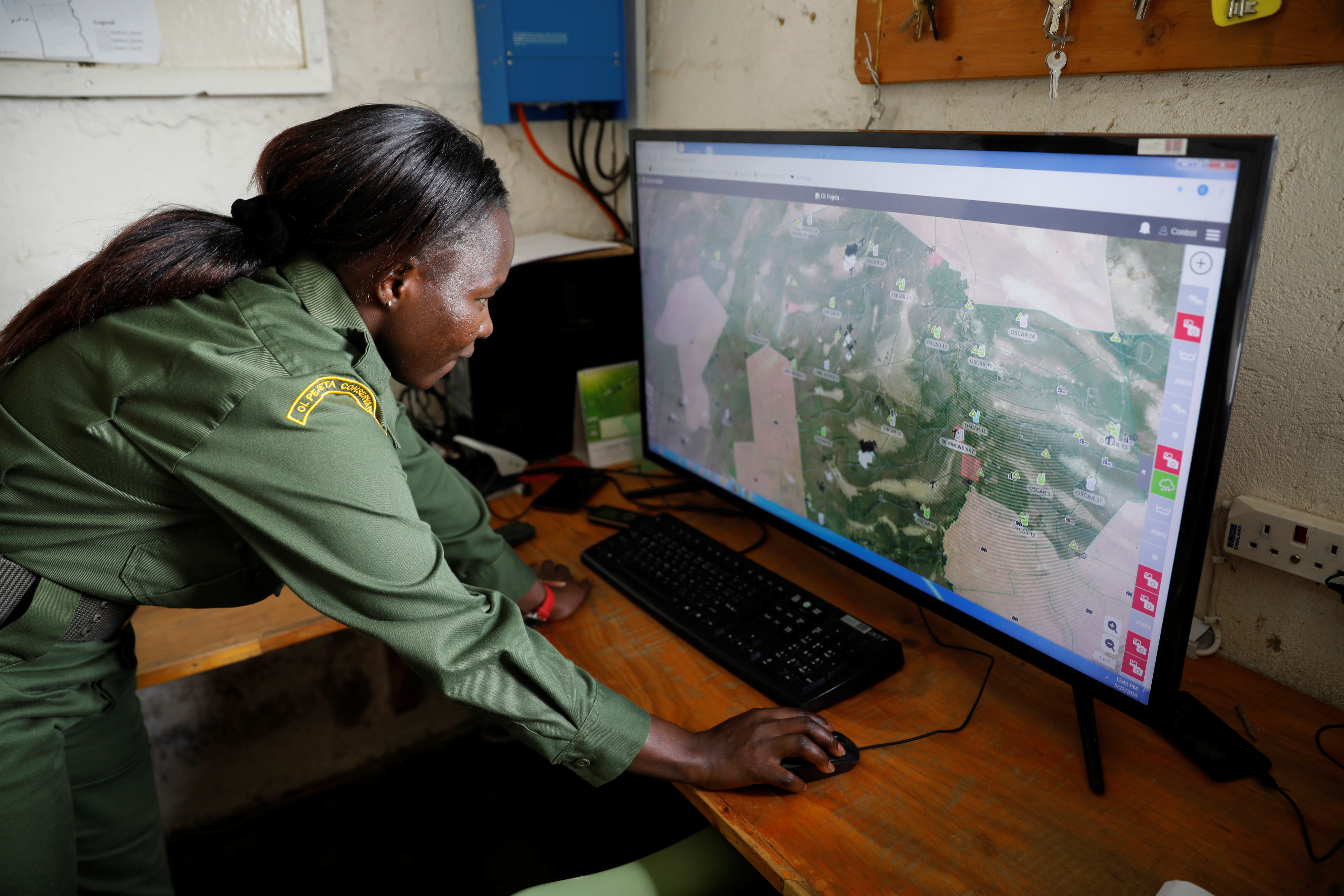 A ranger displays using the EarthRanger conservation platform at the Ol Pejeta Conservancy in Laikipia national park near Nanyuki, Kenya, May 22, 2019. Picture taken May 22, 2019. REUTERS/Baz Ratner