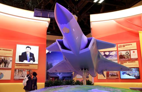 A model depicting J-20 stealth fighter of People's Liberation Army (PLA) is seen at an exhibition on China's achievements marking the 70th anniversary of the founding of the People's Republic of China (PRC) at the Beijing Exhibition Center, in Beijing, China September 24, 2019. REUTERS/Jason Lee