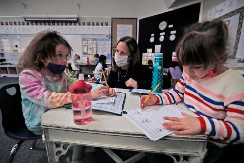 Thorpe Creek Elementary first grade teacher Courtney Gibson, center, works with students Maddie Watson and Katherine Sukhanych during class Monday, Nov. 22, 2021 in Fishers. Several teachers are related at the Hamilton Southeastern school. Gibson's sister, Kristi King, also teaches at the school.There Are A Lot Of Family Connections At Thorpe Creek Elementary In Fishers