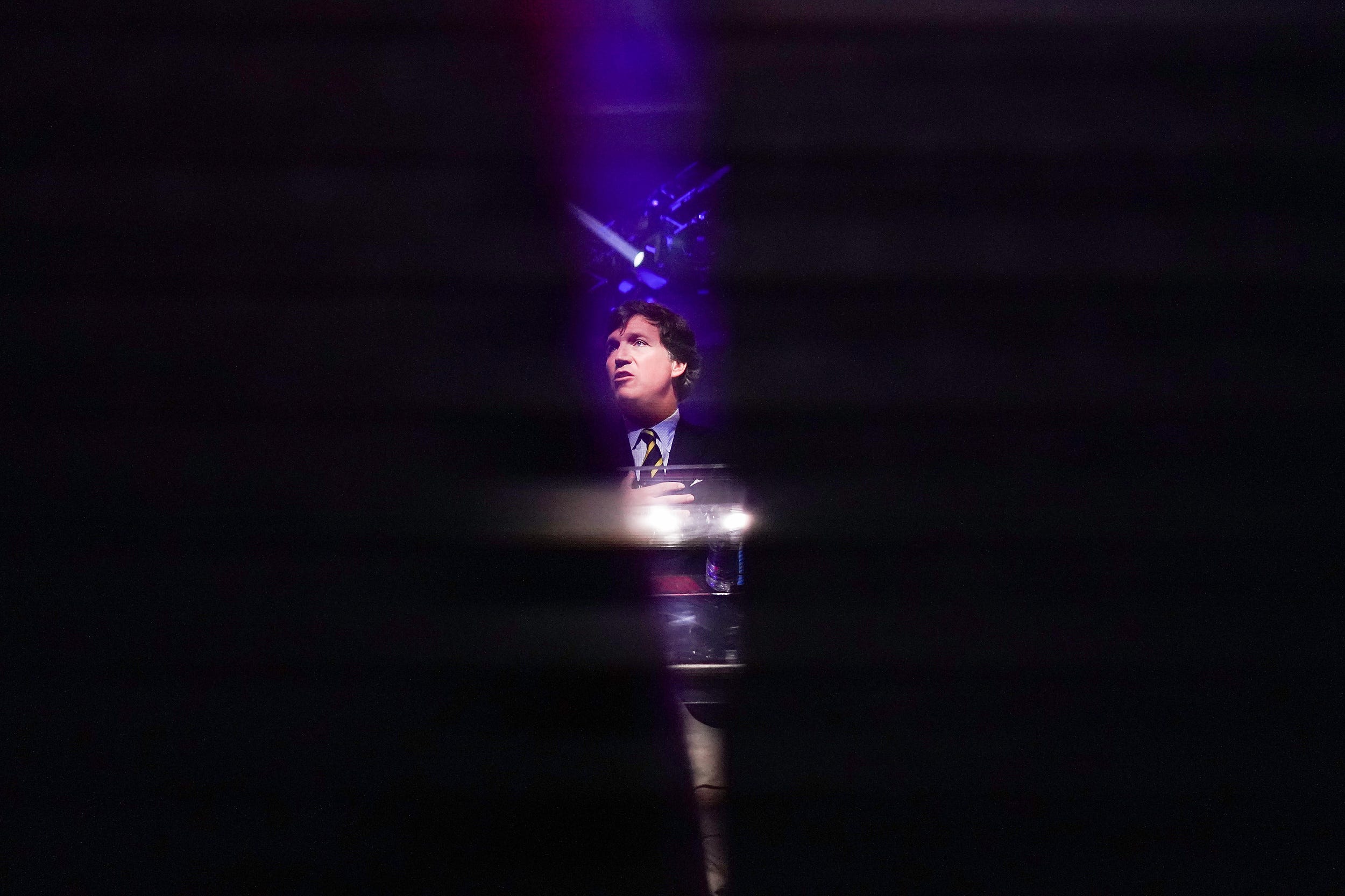 Tucker Carlson speaks during the first day of the America Fest 2021 hosted by Turning Point USA on Saturday, Dec. 18, 2021, in Phoenix.Uscp 7iwow2har2f6a3xo8hb Original