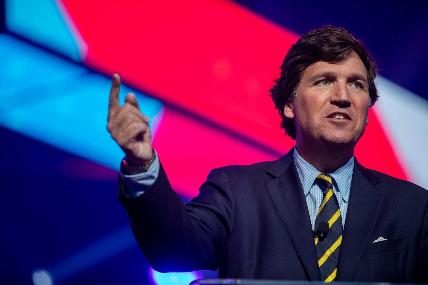 Tucker Carlson speaks during the first day of the America Fest 2021 hosted by Turning Point USA on Saturday, Dec. 18, 2021, in Phoenix.Uscp 7iwow2zkgjnq90mp8hb Original