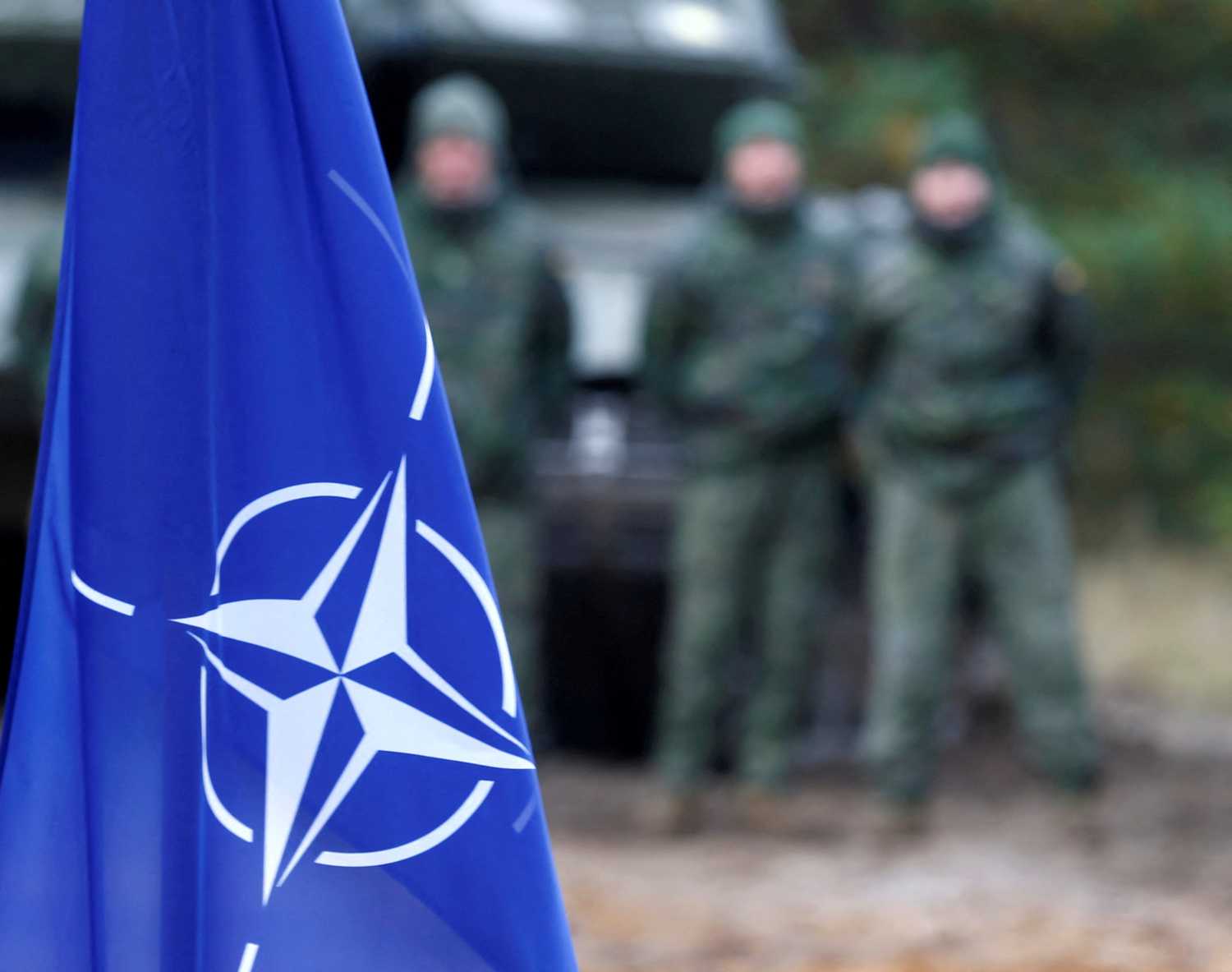 FILE PHOTO: NATO flag is seen during NATO enhanced Forward Presence battle group military exercise Silver Arrow in Adazi, Latvia October 5, 2019. REUTERS/Ints Kalnins/File Photo