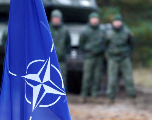 FILE PHOTO: NATO flag is seen during NATO enhanced Forward Presence battle group military exercise Silver Arrow in Adazi, Latvia October 5, 2019. REUTERS/Ints Kalnins/File Photo