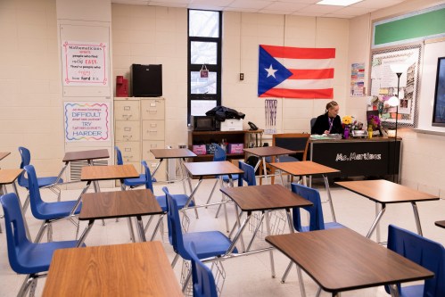 Ms. Leila E. Martinez, a Puerto Rican math teacher at Iroquois High School, teaches her class virtually from school after students have gone remote for a second week as cases of the Omicron coronavirus variant continue to surge and the untenable staffing numbers in schools  in Louisville, Kentucky, U.S. January 21, 2022. REUTERS/Amira Karaoud