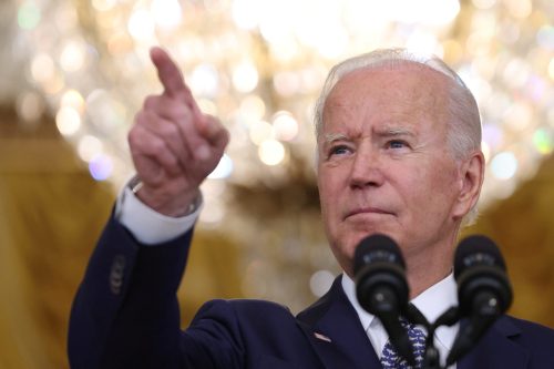 FILE PHOTO: U.S. President Joe Biden answers questions from reporters in the East Room of the White House in Washington, U.S., August 10, 2021. REUTERS/Evelyn Hockstein/File Photo
