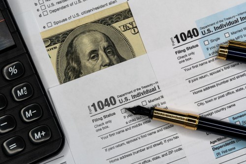 tax forms and a calculator.