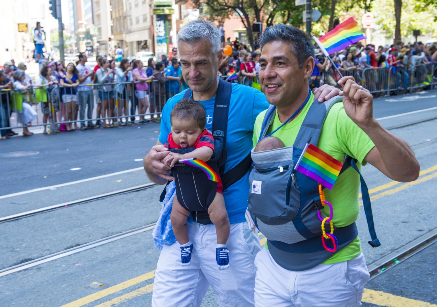 A gay couple and their two children participates at the annual San Francisco Gay pride parade in San Francisco in June 2019.