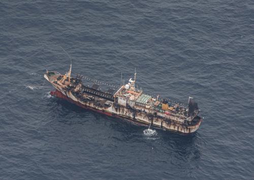 A fishing boat is seen from an aircraft of the Ecuadorian navy after a fishing fleet of mostly Chinese-flagged ships was detected in an international corridor that borders the Galapagos Islands' exclusive economic zone, in the Pacific Ocean August 7, 2020. Picture taken August 7, 2020.  REUTERS/Santiago Arcos