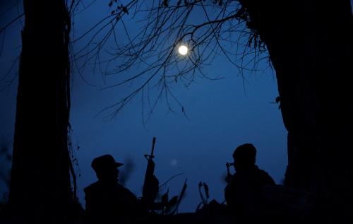 Members of the People's Defence Forces (PDF) who became guerrilla fighters after being protesters are seen on the front line in Kawkareik, Myanmar December 19, 2021. Picture taken December 19, 2021. REUTERS/Stringer