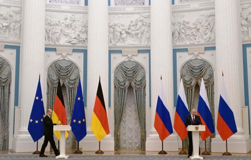 Russian President Vladimir Putin and German Chancellor Olaf Scholz attend a joint news conference in Moscow, Russia February 15, 2022. Sputnik/Sergey Guneev/Kremlin via REUTERS ATTENTION EDITORS - THIS IMAGE WAS PROVIDED BY A THIRD PARTY.