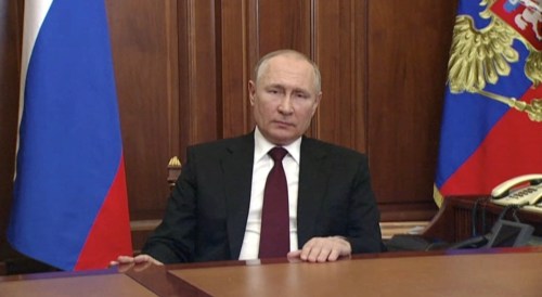 Russian President Vladimir Putin delivers a video address to the nation, following the initiative of the country's lower house of parliament and security council to recognise two Russian-backed breakaway regions in eastern Ukraine as independent entities, in Moscow, Russia, in a still image taken from video footage released February 21, 2022. Russian Pool/Reuters TV via REUTERS ATTENTION EDITORS - THIS IMAGE WAS PROVIDED BY A THIRD PARTY.
