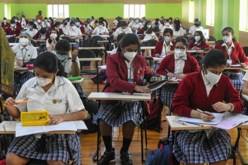 Students as seen inside a classroom of BSS School in Kolkata , India , on 3 February 2022 . School reopens after being shut due to restrictions caused by the spread of new Omicron variant of Coronavirus in Kolkata . (Photo by Debarchan Chatterjee/NurPhoto)NO USE FRANCE