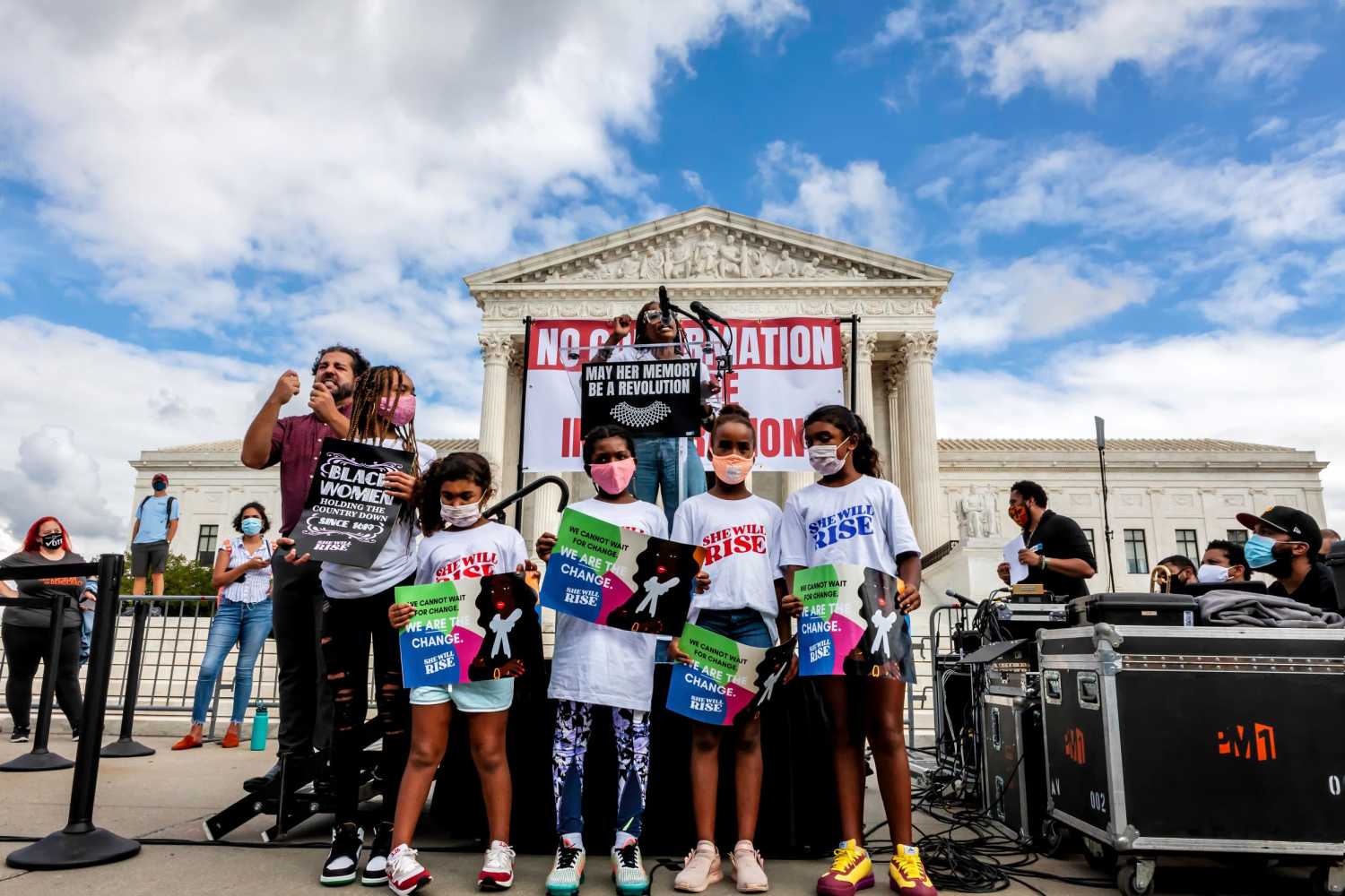Sabrina Williams from the She Will Rise campaign to put a black woman on the Supreme Court speaks to the crowd at the No Confirmation Until Inauguration Rally