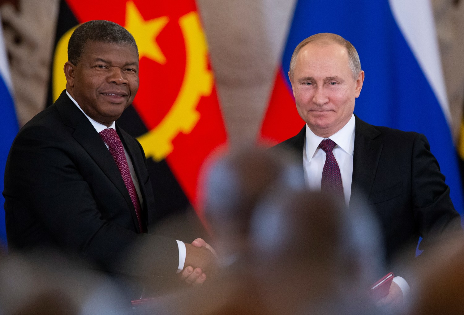 Russian President Vladimir Putin, right, shakes hands with Angola's President Joao Manuel Goncalves Lourenco, after their talks in the Kremlin in Moscow, Russia April 4, 2019. Alexander Zemlianichenko/Pool via REUTERS