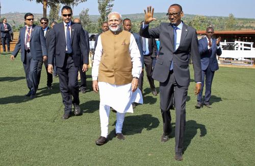 India Prime Minister Narendra Modi accompanied by Rwandan President Paul Kagame arrive at the model village where he gifted 200 cows to villagers who do not yet own one, as part of the Rwandan Government's Girinka "may you have a cow" Programme, in Rweru, Bugesera district, Rwanda July 24, 2018. REUTERS/Jean Bizimana