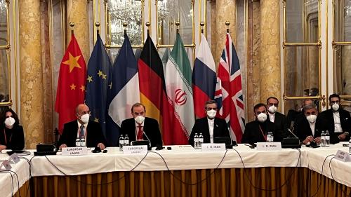 Deputy Secretary General of the European External Action Service (EEAS) Enrique Mora and Iran's chief nuclear negotiator Ali Bagheri Kani wait for the start of a meeting of the JCPOA Joint Commission in Vienna, Austria December 3, 2021. EU Delegation in Vienna/Handout via REUTERS ATTENTION EDITORS - THIS PICTURE WAS PROVIDED BY A THIRD PARTY