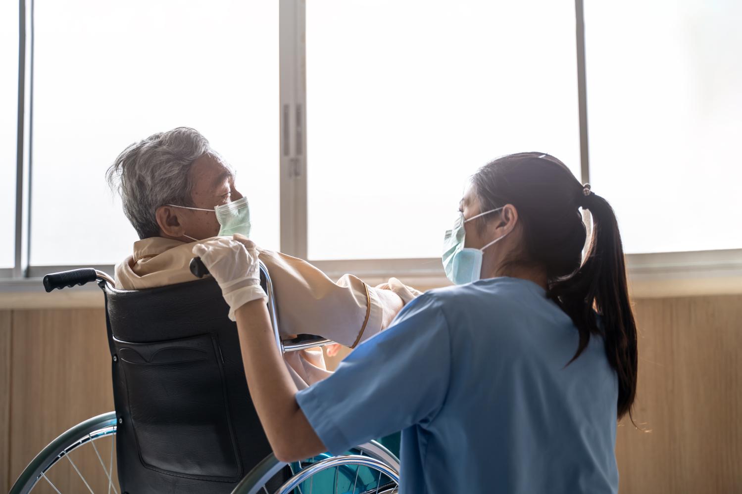 Nurse with Elderly Patient