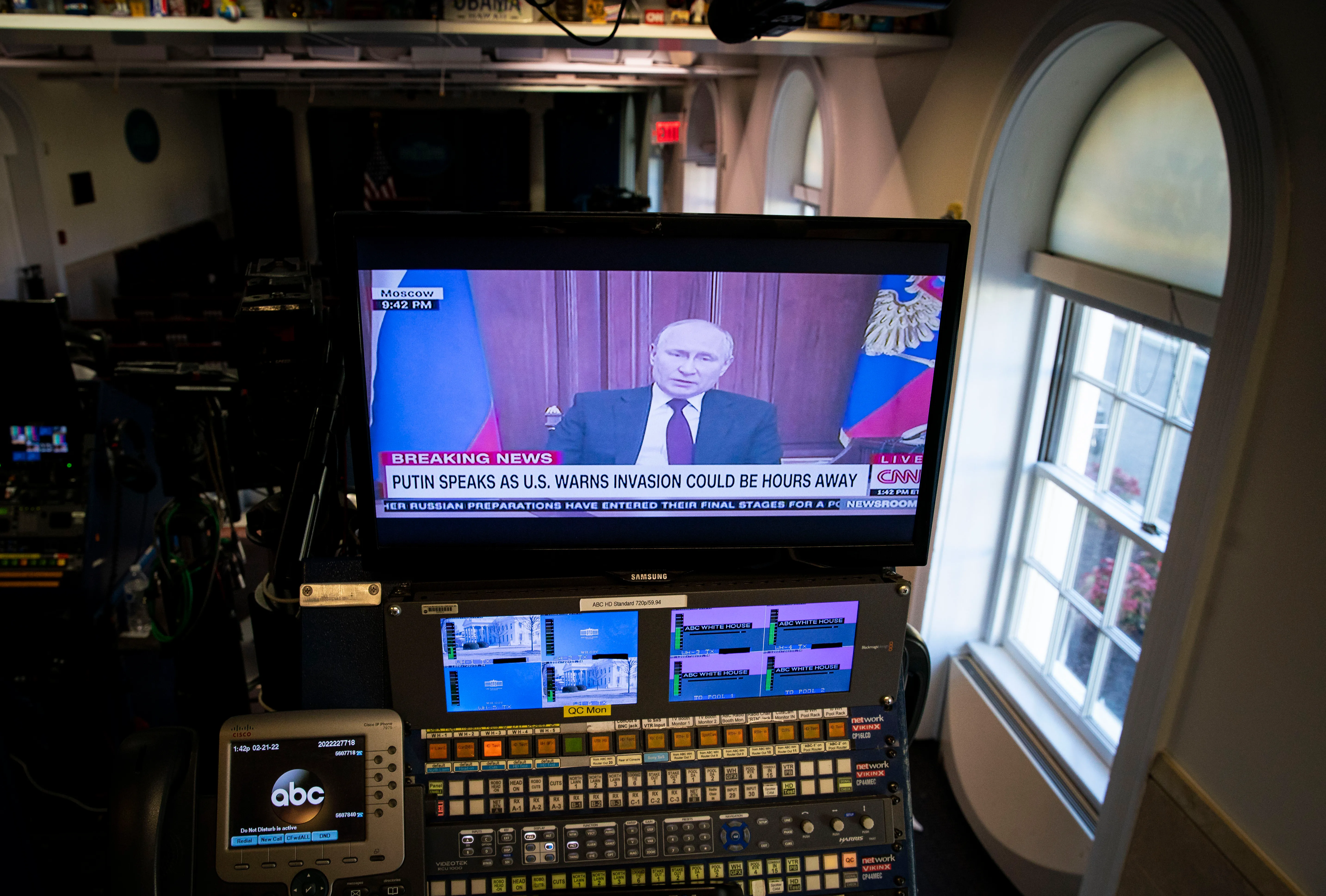 Vladimir Putin, Russia's president, speaks during a news conference, seen on a television monitor in the White House briefing room in Washington, U.S., on Monday, Feb. 21, 2022. Photographer: Al Drago/Pool/Sipa USANo Use Germany.