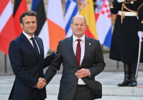 President of France Emmanuel Macron and Chancellor of Germany Olaf Scholz shake hands at the arrivals ahead of an informal meeting of the Heads of State or Government of the European Union, to discuss the consequences of the Russian invasion in Ukraine, in Versailles, near Paris, France, Thursday 10 March 2022.Photo by Christian Liewig/ABACAPRESS.COM
