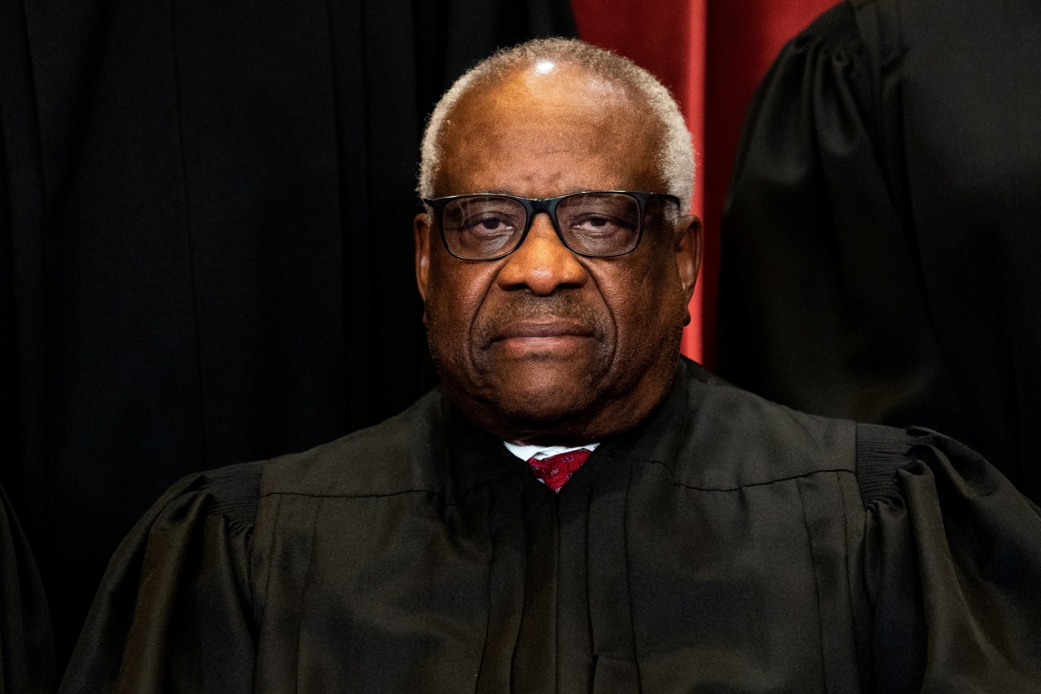 FILE PHOTO: Associate Justice Clarence Thomas poses during a group photo of the Justices at the Supreme Court in Washington, U.S., April 23, 2021. Erin Schaff/Pool via REUTERS/File Photo