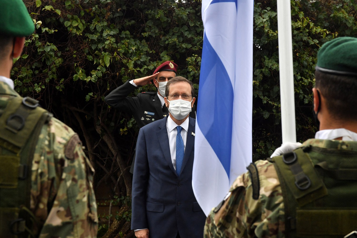 Israeli President Isaac Herzog reviews the Cypriot President Honour Guard in Nicosia during an official meeting in Nicosia, Cyprus, March 2, 2022. Iakovos Hatzistavrou/Pool via REUTERS