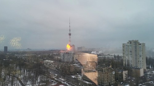 A TV tower explodes following an attack by Russian forces, amid Russia's invasion of Ukraine, in Kyiv, Ukraine March 1, 2022 in this still image taken from a video obtained from social media. Youtube MEDplus/via REUTERS