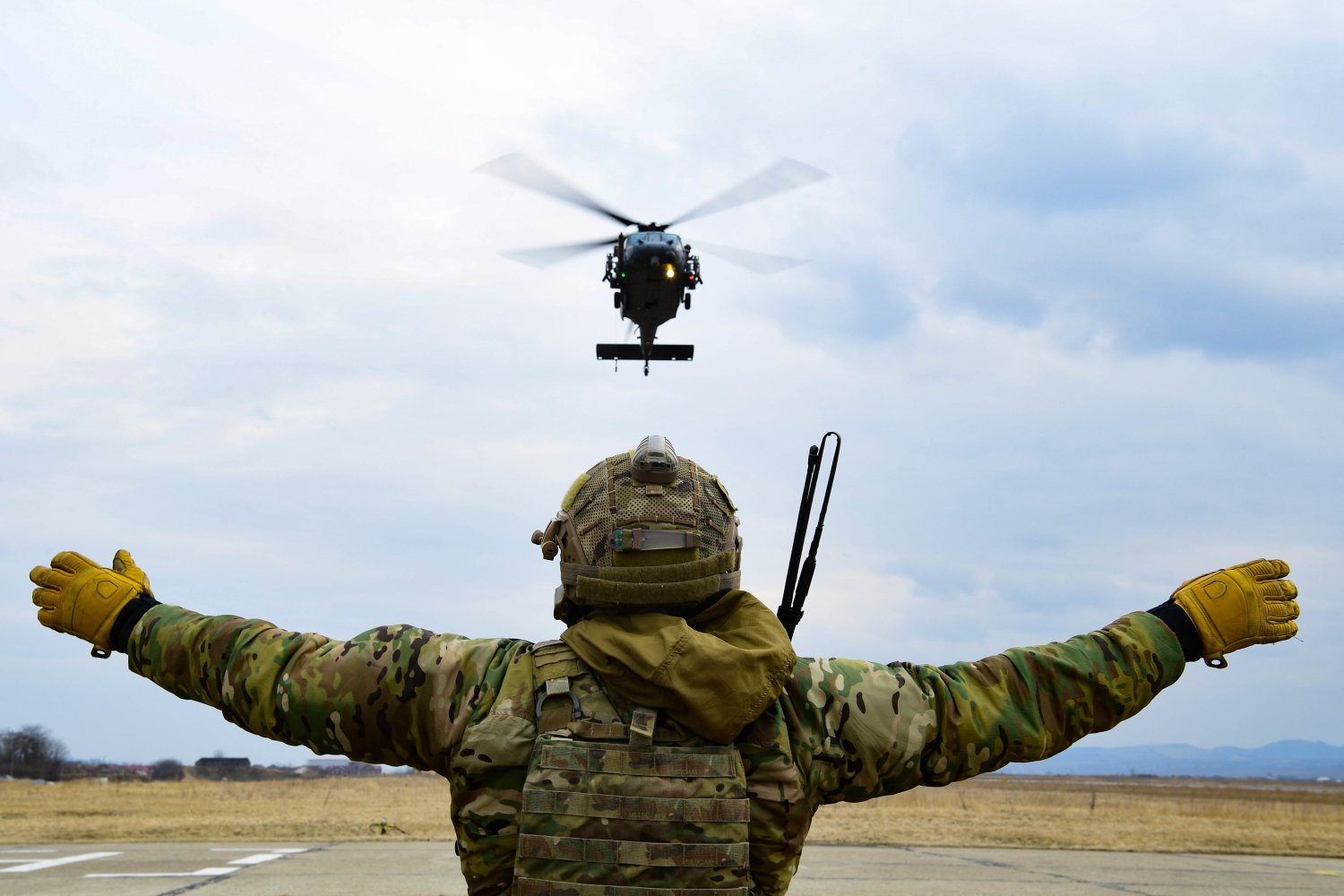 A US Air Force pararescueman assigned to the 57th Rescue Squadron performs dynamic hoist training with an HH-60G Pave Hawk helicopter in Romania on Wednesday March 9, 2022 during joint training missions with the Romanian air force in support of the NATO alliance. The U.S. military ordered the deployment of 500 additional troops to Europe, pushing the total number of American forces on the continent to about 100,000 as it seeks to deter Russia from broadening its unprovoked war in Ukraine, Pentagon officials said Monday. (US DOD/EYEPRESS)