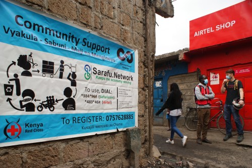 Signage for Sarafu on the streets of Mukuru Kayiaba slum in Nairobi, Kenya, July 28, 2020. Thomson Reuters Foundation/Kagondu Njagi