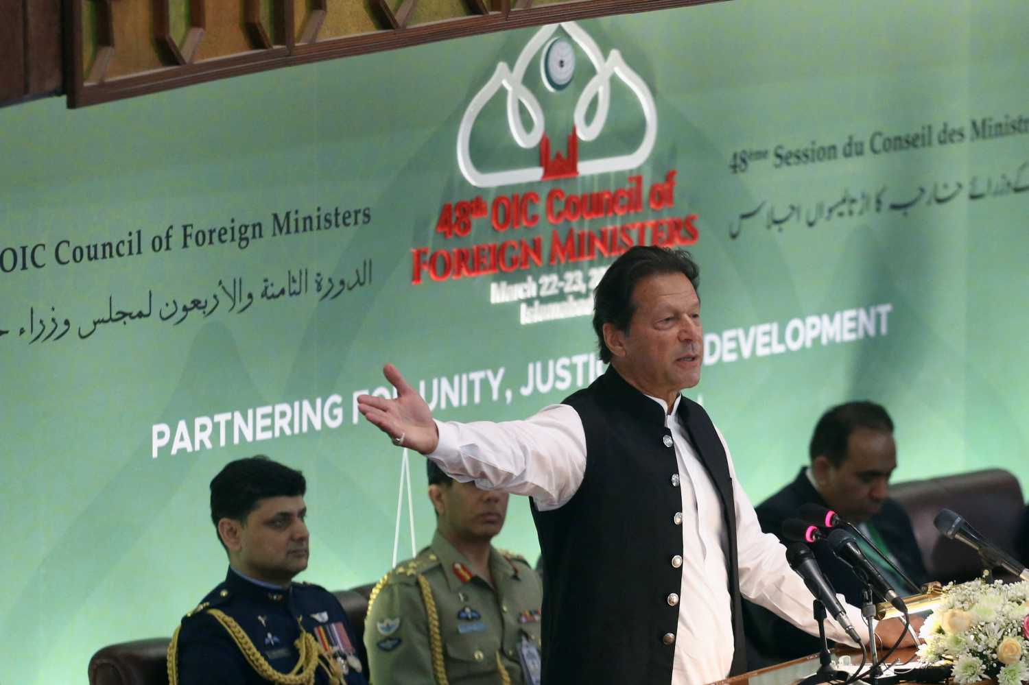 Pakistan’s Prime Minister Imran Khan gives the keynote speech at the 48th meeting of the Organisation of Islamic Cooperation (OIC) Council of Foreign Ministers, with the theme being ‘Building Partnerships for Unity, Justice & Development’, in Islamabad, Pakistan March 22, 2022. REUTERS/Saiyna Bashir