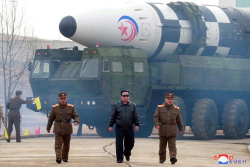North Korean leader Kim Jong Un walks away from what state media report is a "new type" of intercontinental ballistic missile (ICBM) in this undated photo released on March 24, 2022 by North Korea's Korean Central News Agency (KCNA). KCNA via REUTERS    ATTENTION EDITORS - THIS IMAGE WAS PROVIDED BY A THIRD PARTY. REUTERS IS UNABLE TO INDEPENDENTLY VERIFY THIS IMAGE. NO THIRD PARTY SALES. SOUTH KOREA OUT. NO COMMERCIAL OR EDITORIAL SALES IN SOUTH KOREA.     TPX IMAGES OF THE DAY - RC299T9CYPBG