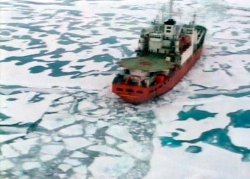 The Russian research vessel the Akademik Fyodorov with miniature submarines on board sails in the Arctic Ocean in this Reuters Television image taken from a television broadcast August 2, 2007. Two Russian submersibles started a dive into the Arctic Ocean on Thursday in a mission to symbolically claim the resource-rich region by planting a flag on the seabed under the North Pole, Russian media reported.  REUTERS/Reuters Television (RUSSIA)