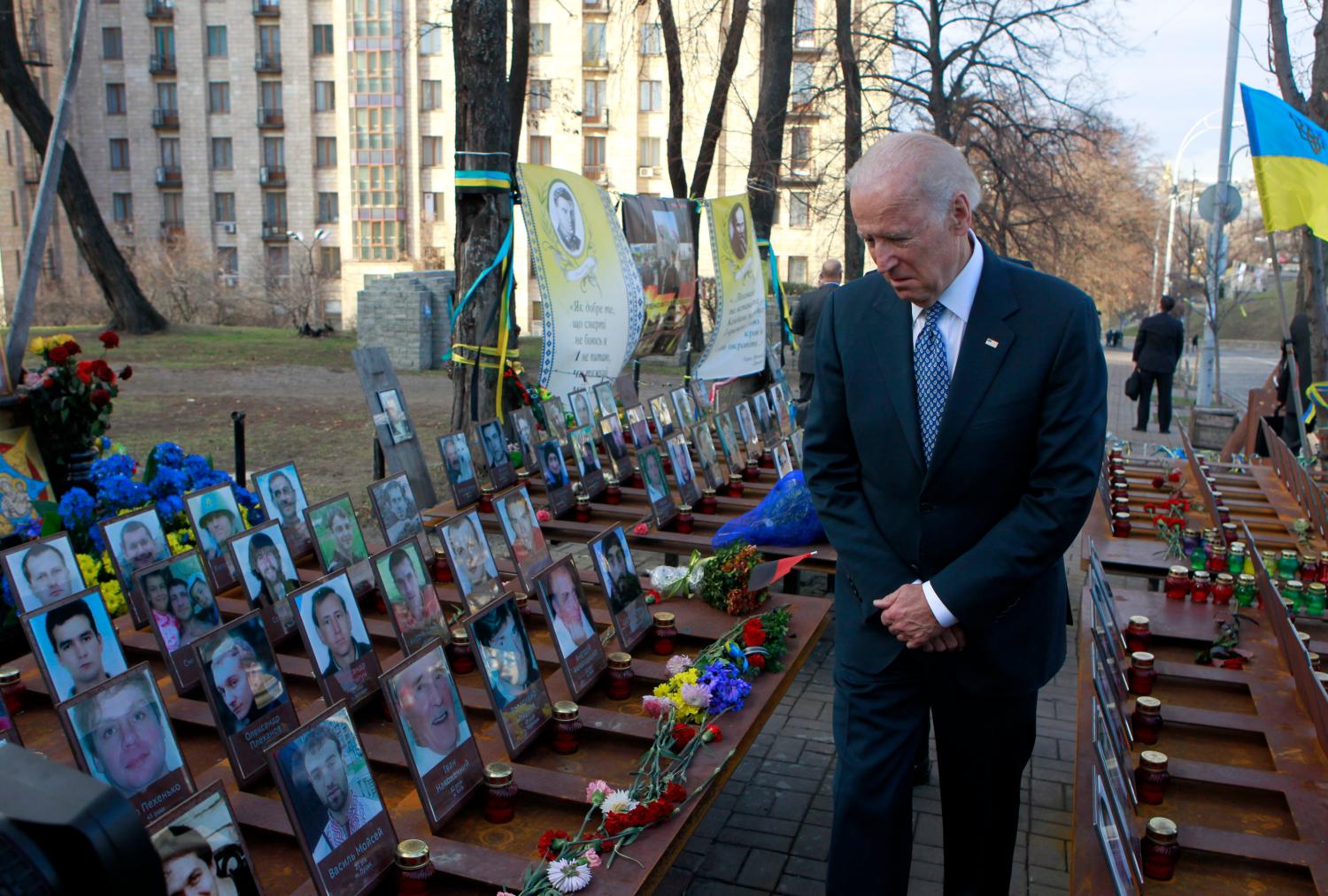 U.S. Vice President Joe Biden visits the monument to the so-called "Heavenly Sotnya" (Hundred) in Kiev, Ukraine, December 7, 2015. The monument was erected to commemorate the fallen demonstrators who were killed during the EuroMaidan protests in 2014. REUTERS/Sergei Chuzavkov/Pool