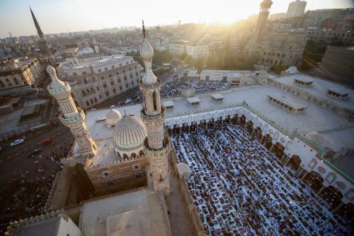 Worshippers perform Eid al-Fitr prayer at Al-Azhar Mosque. Eid al-Fitr marks the end of the holy Islamic fasting month of Ramadan.