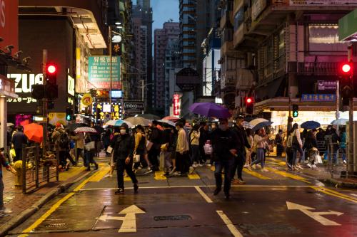 Hong Kong, China, 2 Apr 2022,  People cross the street in Sai Yeung Choi South street in Mongkok. As COVID cases came down, Hongkongers went out massively. (Photo by Marc Fernandes/NurPhoto)NO USE FRANCE