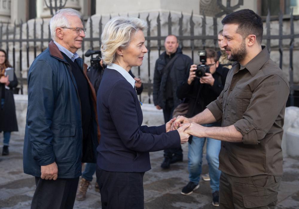 Handout photo made available by Ukrainian Presidency shows European Commission President Ursula von der Leyen and President of Ukraine Volodymyr Zelenskyy shake hands, as European Union High Representative for Foreign Affairs and Security Policy Josep Borrell looks on, ahead of their meeting in Kyiv, Ukraine on April 8, 2022. Photo by Ukrainian Presidency via ABACAPRESS.COM